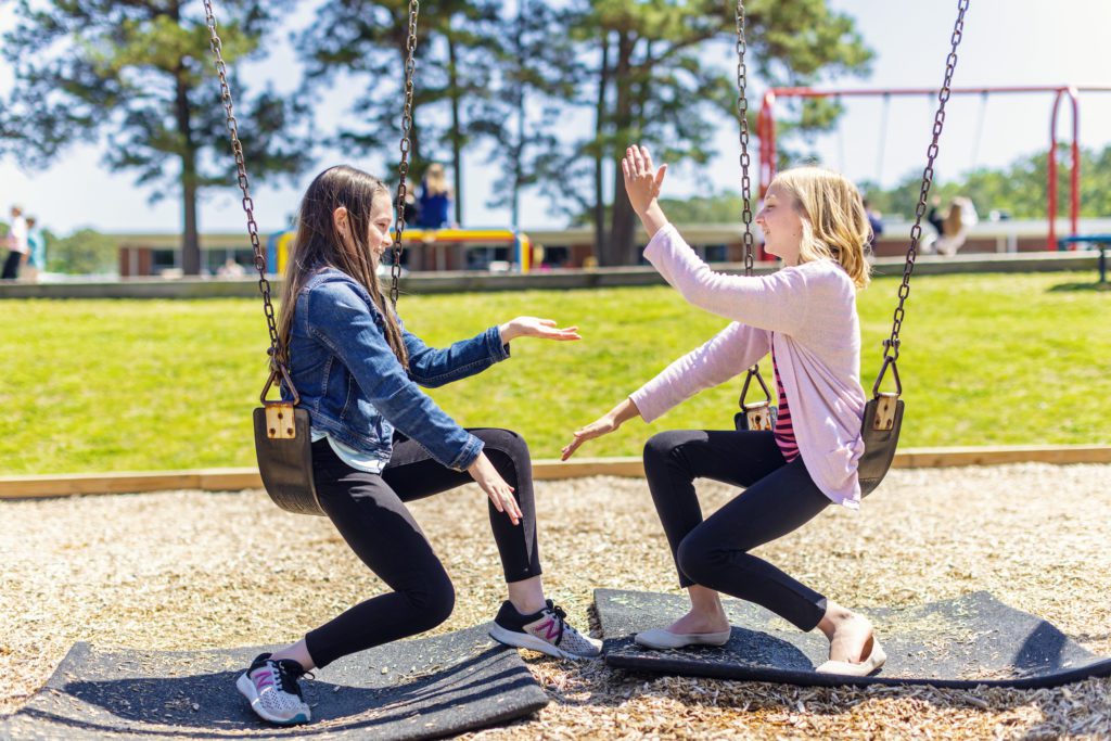 Girls playing on playground